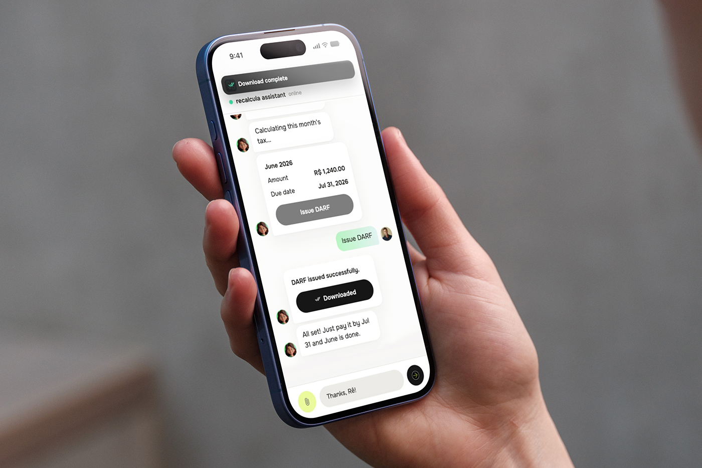 Hand holding a phone showing a DARF issued inside the chat with Rê